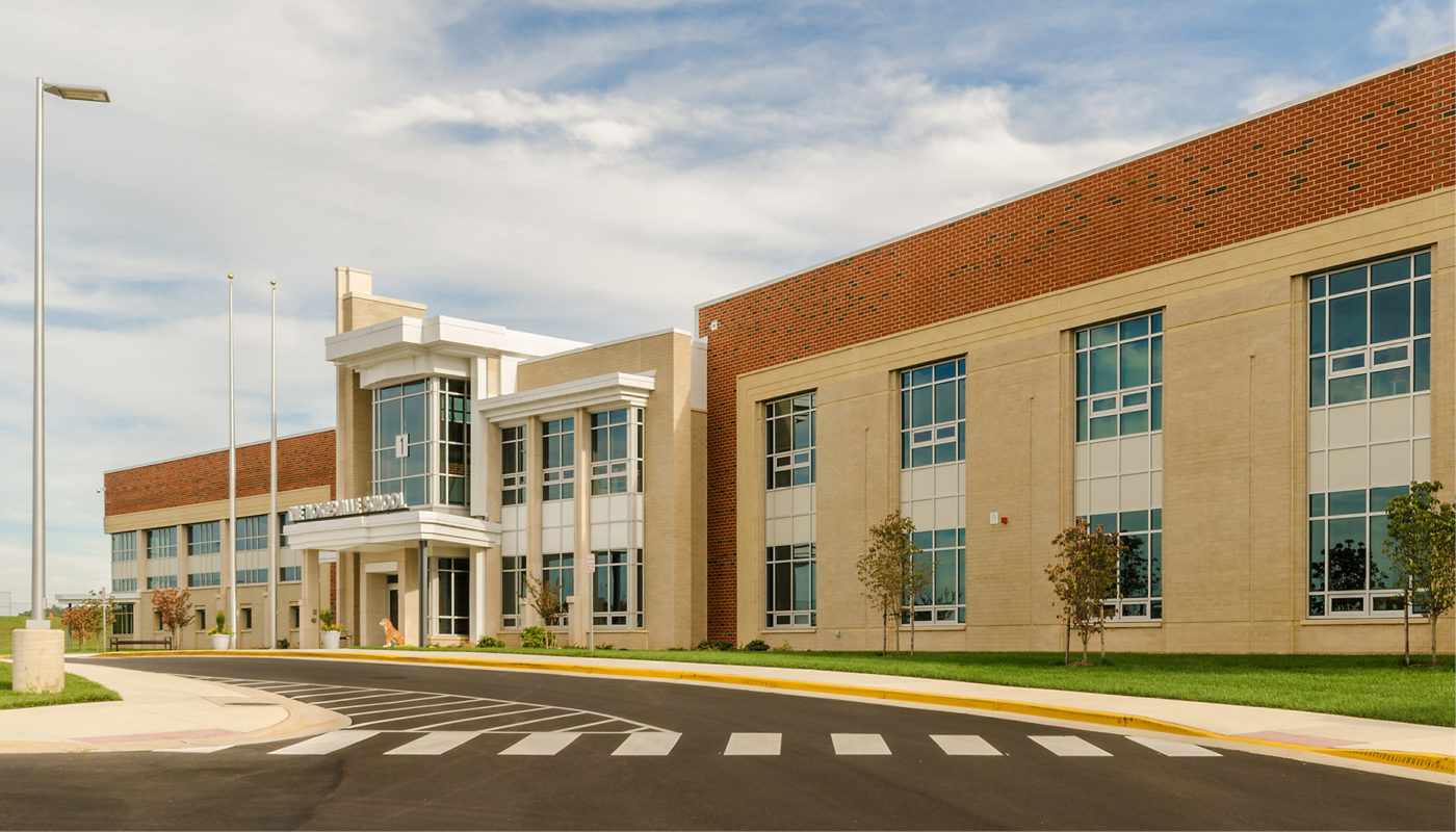 The Nokesville K-8 School, a part of Prince William County Public Schools, is located in a building with a crosswalk in front of it.