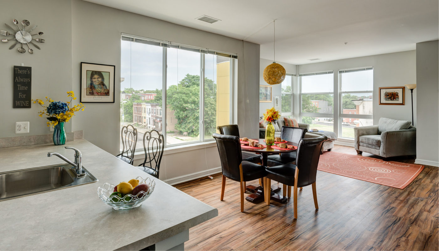 A North Barclay Green kitchen with hardwood floors and a view of the city.
