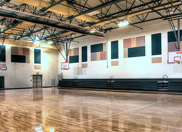 A basketball court in a middle school gym in Northumberland.