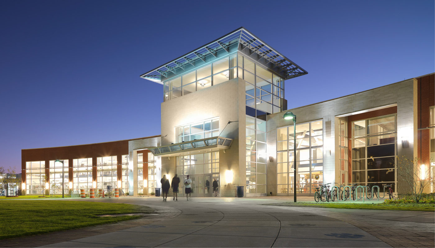 The Wellness Center at Old Dominion University, a building with a glass facade, offers state-of-the-art recreational facilities for students and the community.