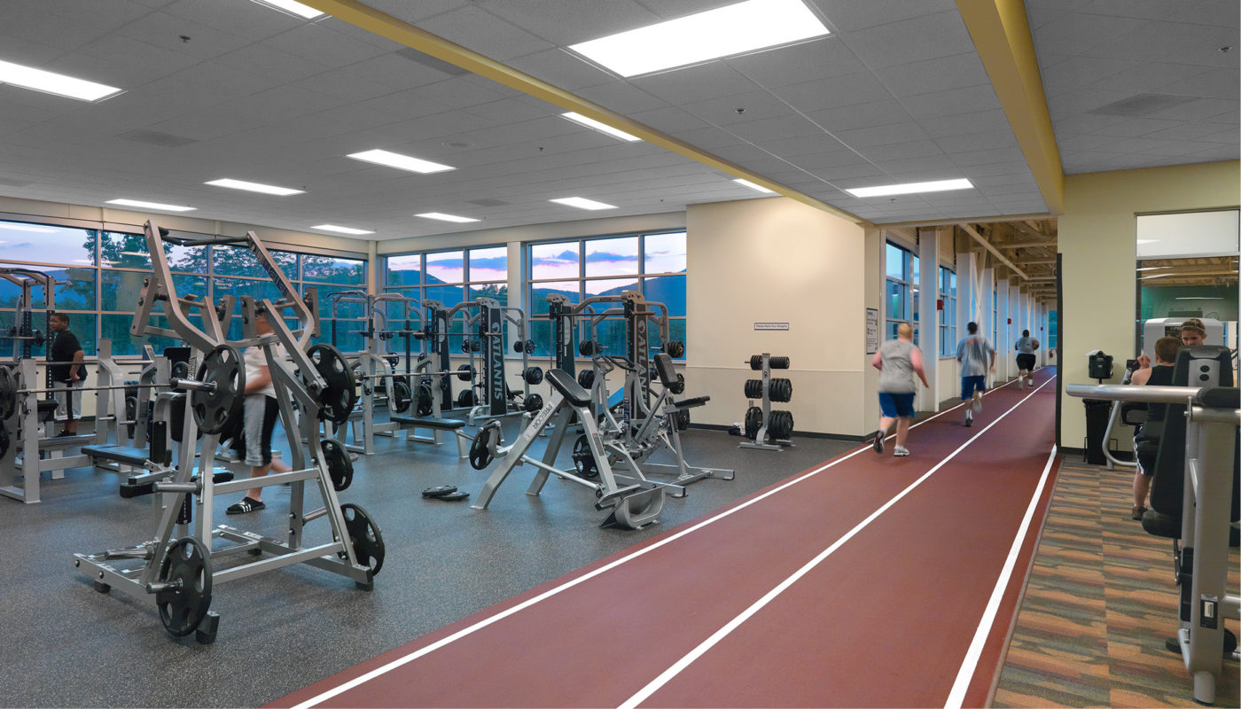 The Green Ridge Recreation Center in Roanoke County is a bustling gym, filled with active individuals who can be seen working out on treadmills and lifting weights.