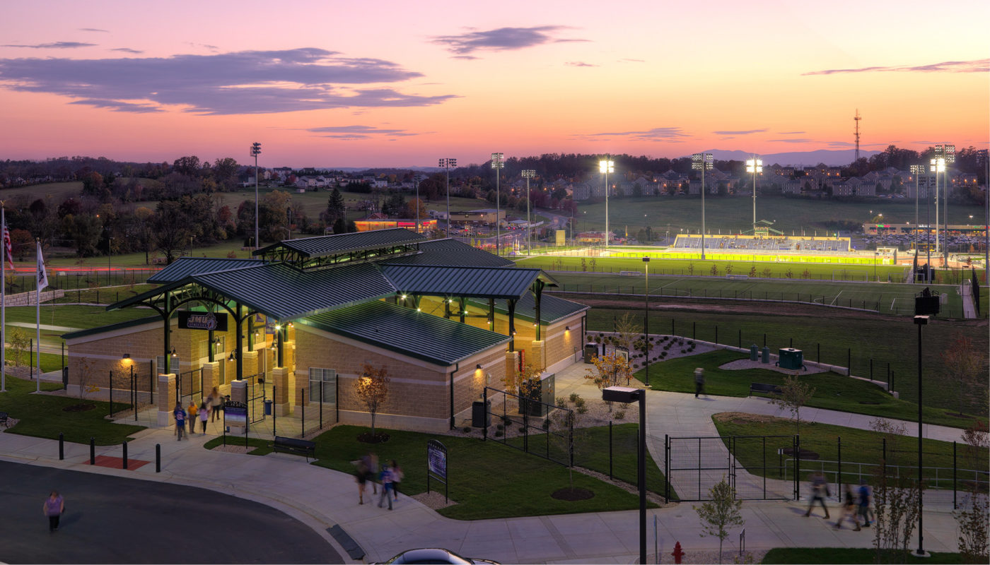 A baseball field at dusk.