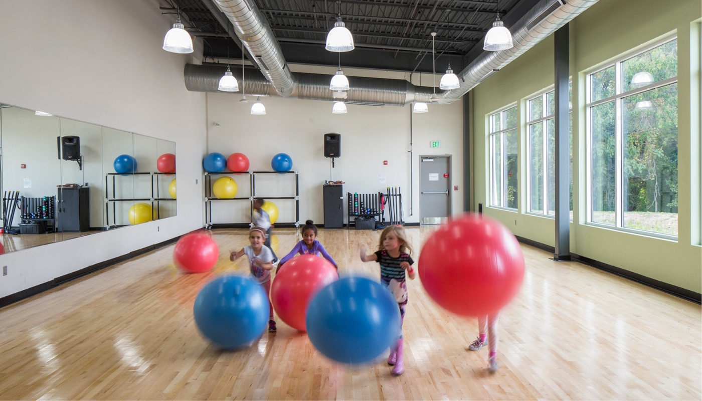 A group of children playing with balls at the Catonsville Family Center in Maryland.