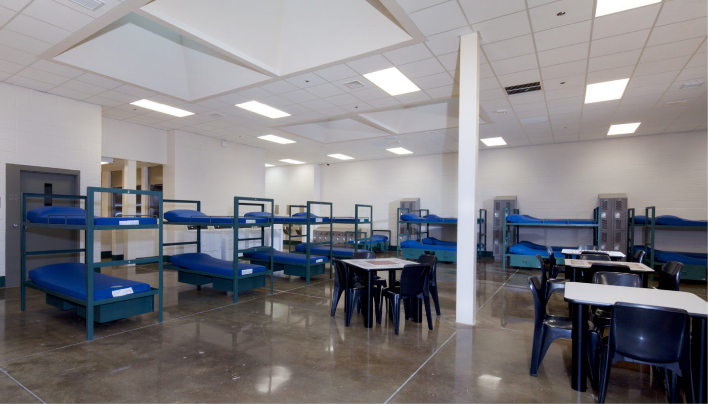 An Adult Detention Center in Amherst filled with bunk beds.