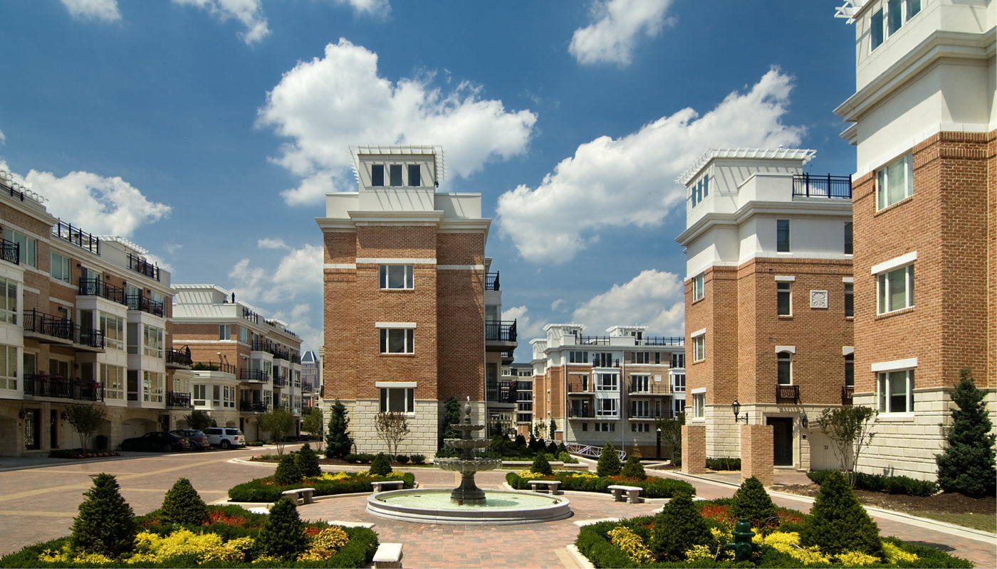 The Harborview, a brick building nestled in the middle of a courtyard at Pier Housing.