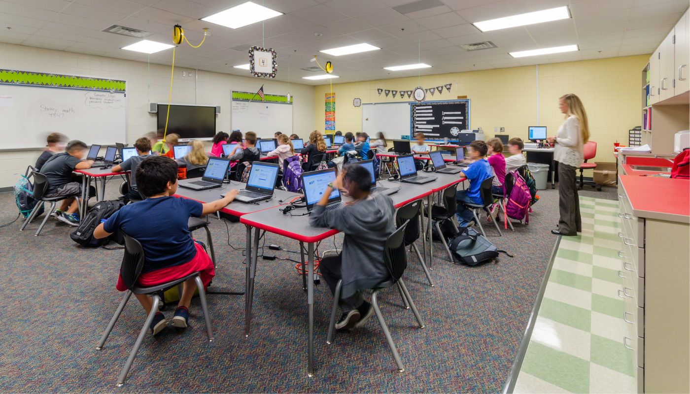 A classroom full of students using laptops at Chris Yung Elementary School in Prince William County Public Schools.
