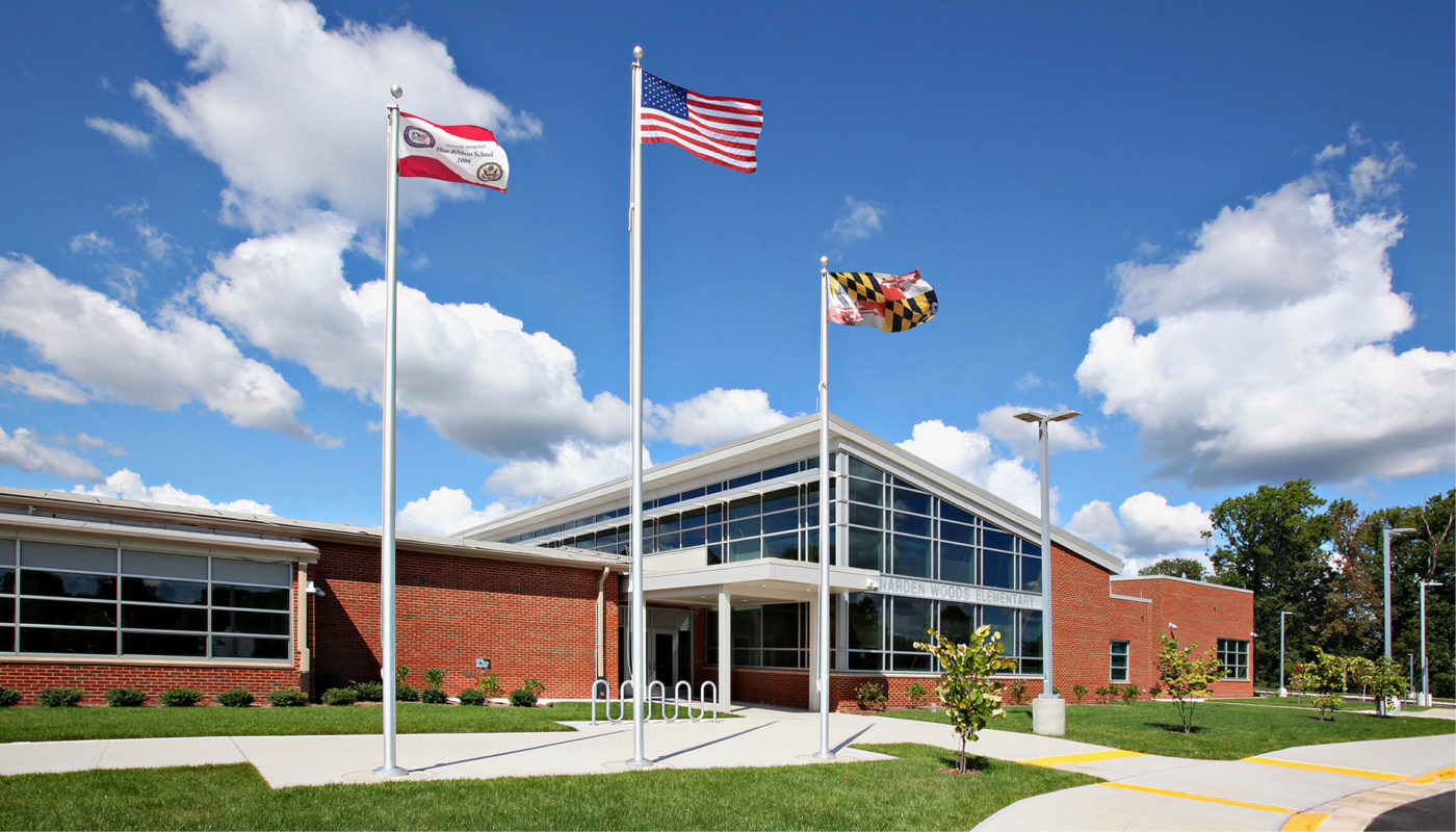Glenarden Woods Elementary School under a blue sky with white clouds in Prince George's County Public Schools.