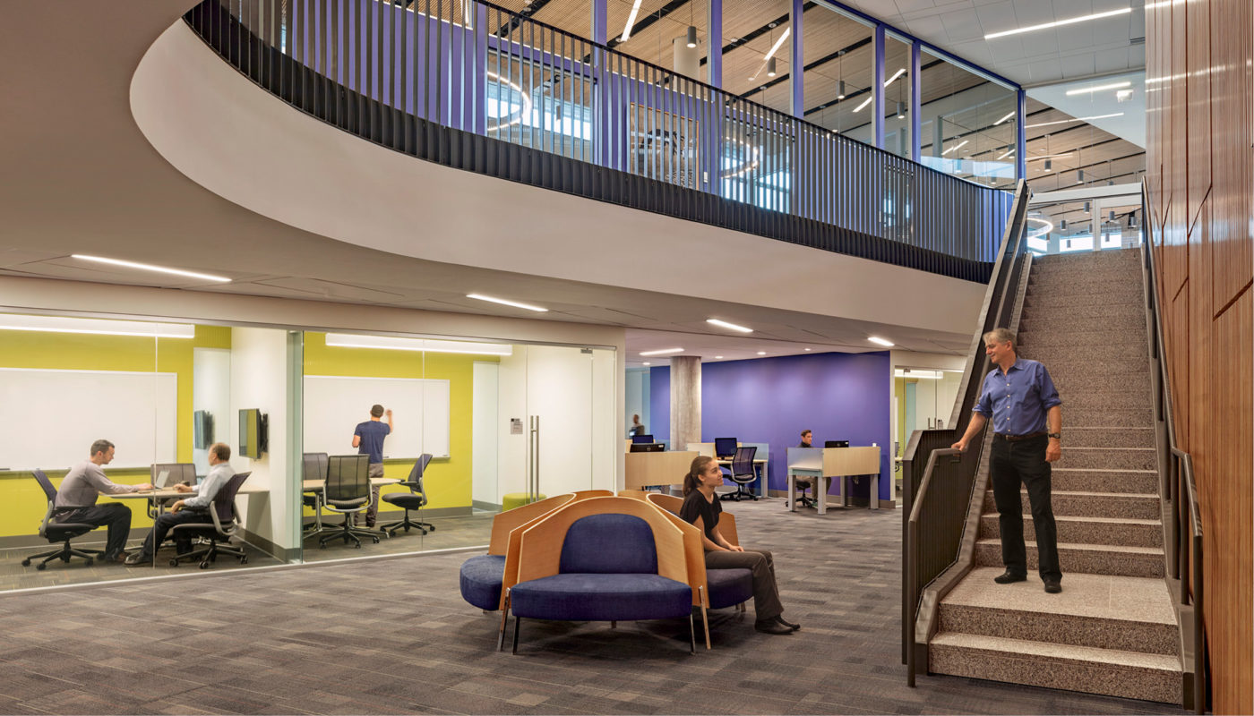 The James Branch Cabell Library at Virginia Commonwealth University features an office space adorned with a spiral staircase and desks.