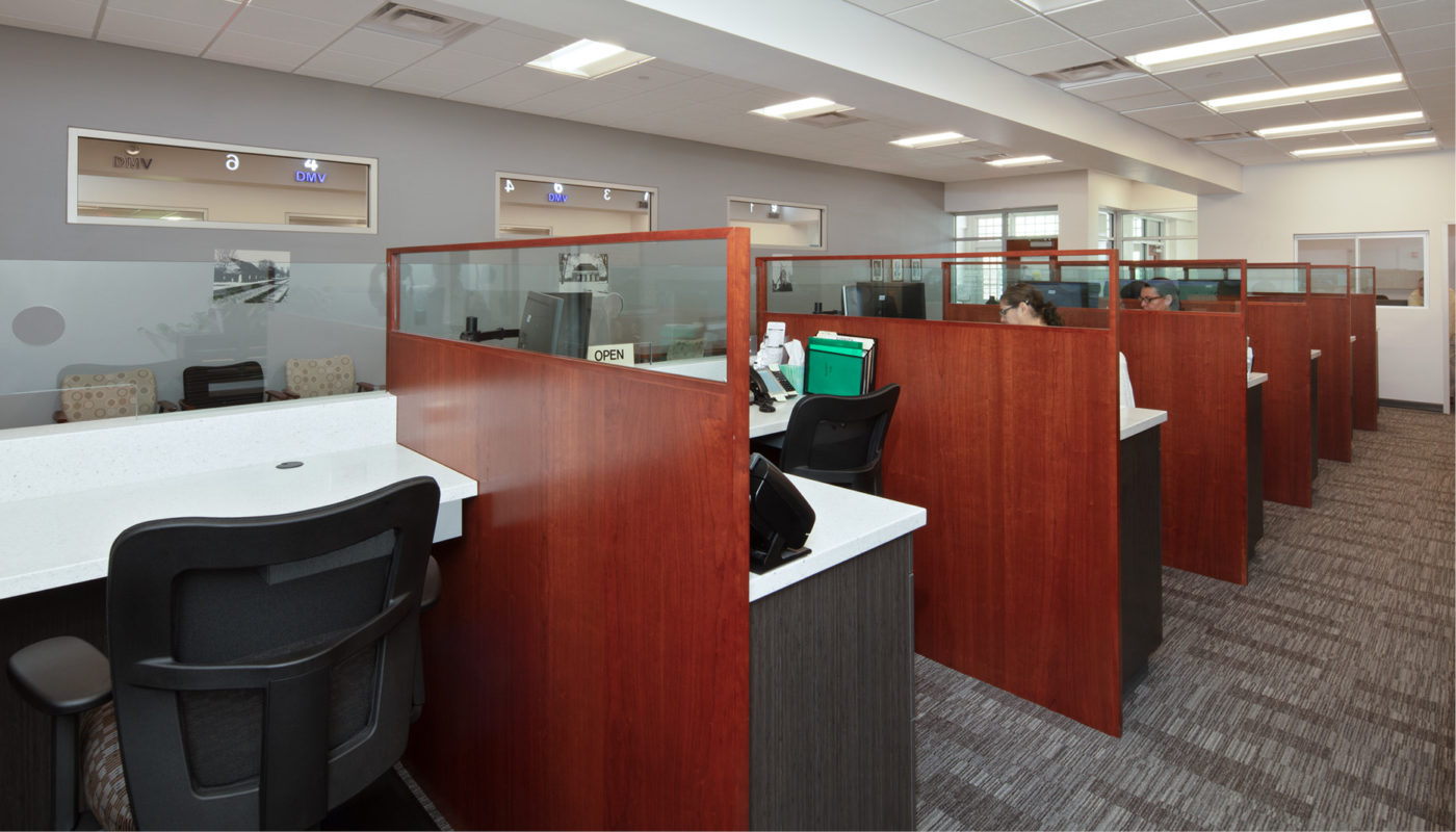 Located in the Chenault-Weems Building, this office space features several desks and chairs.