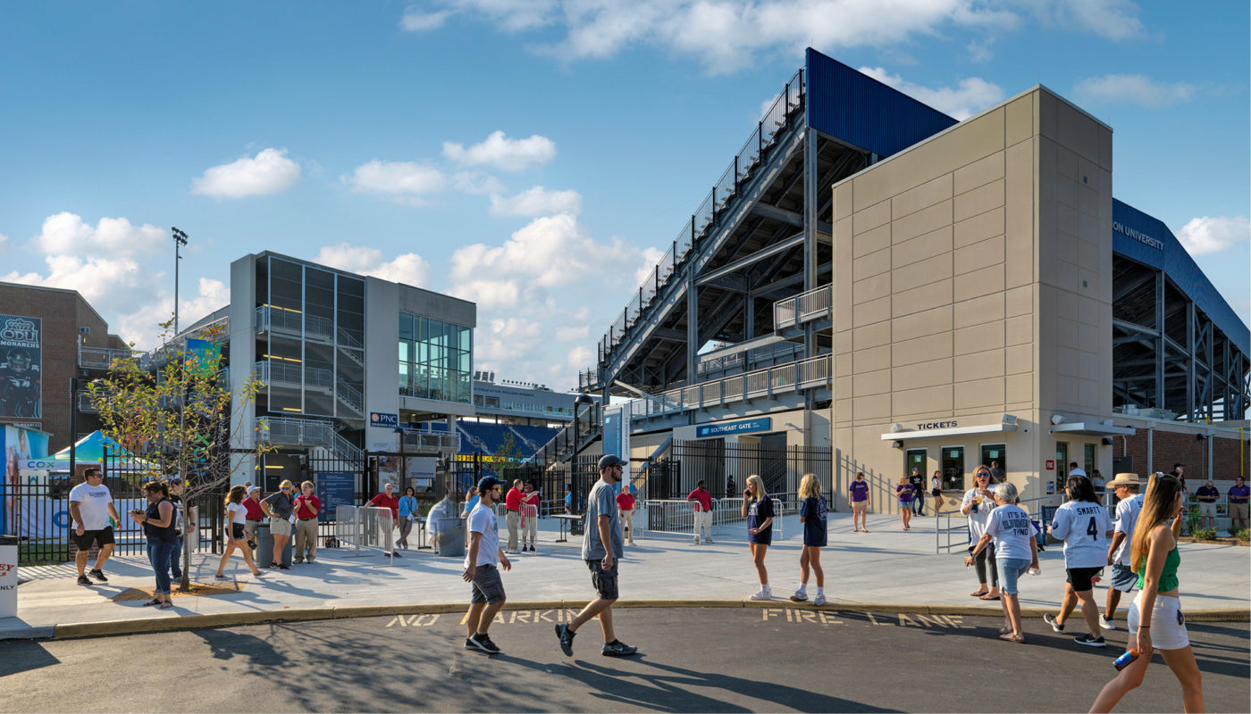 A rendering of S.B. Ballard Stadium at Kornblau Field, with people walking in front of it at Old Dominion University.