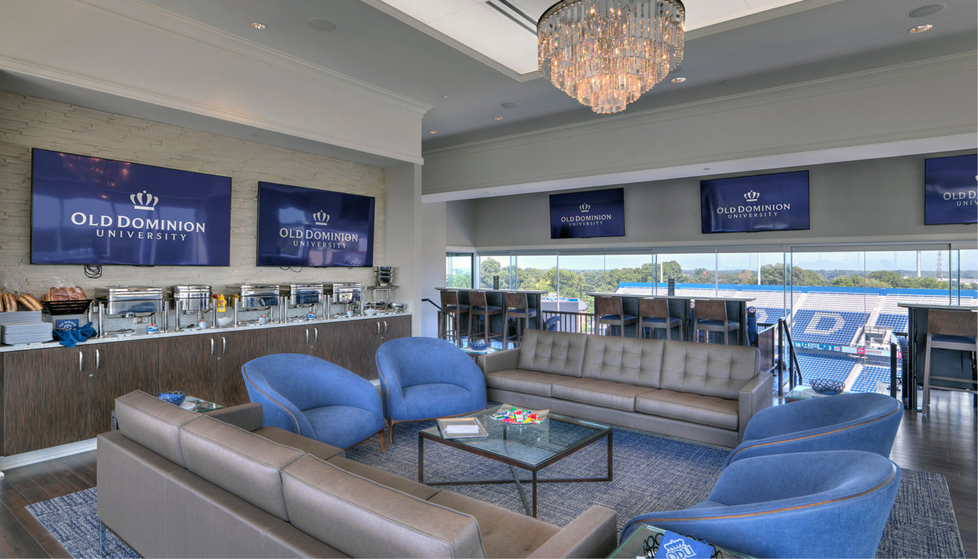 Old Dominion University: A large living room with couches and a television, perfect for gathering friends and watching the latest game at S.B. Ballard Stadium or Kornblau Field.