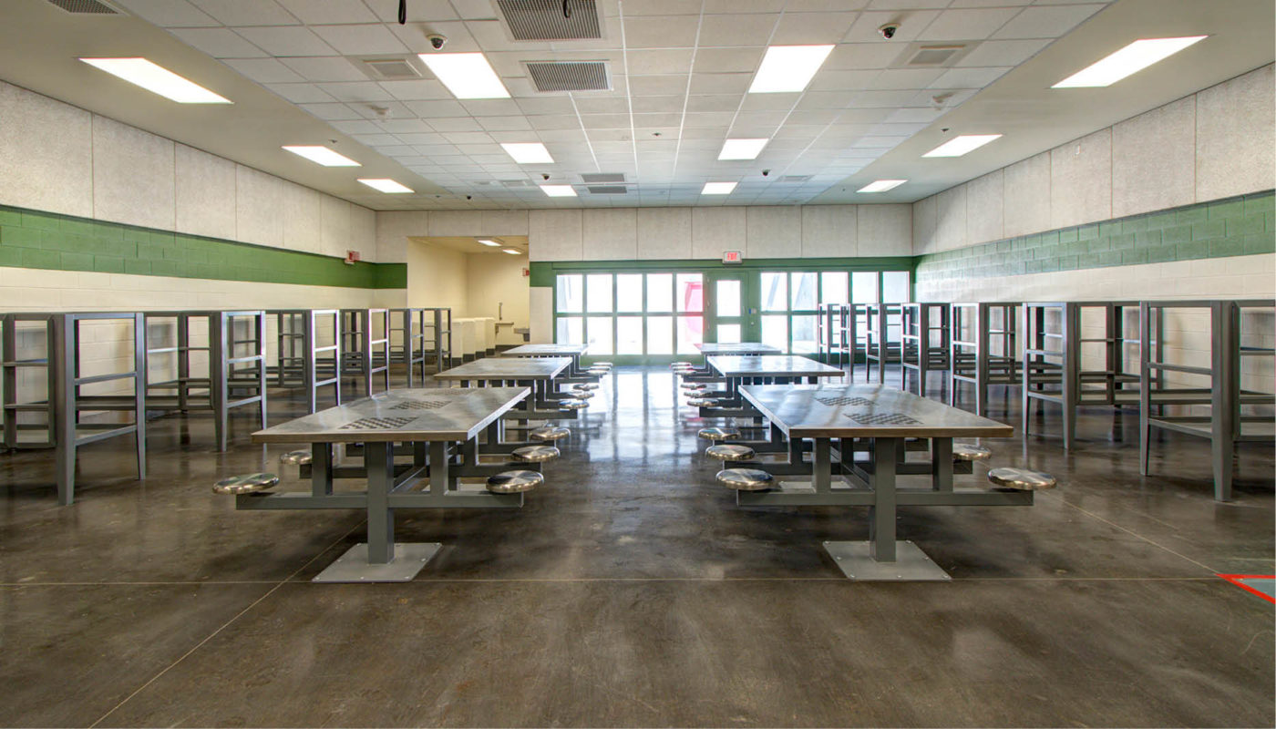 A room full of tables and chairs at the L.C. Knight Detention Center.