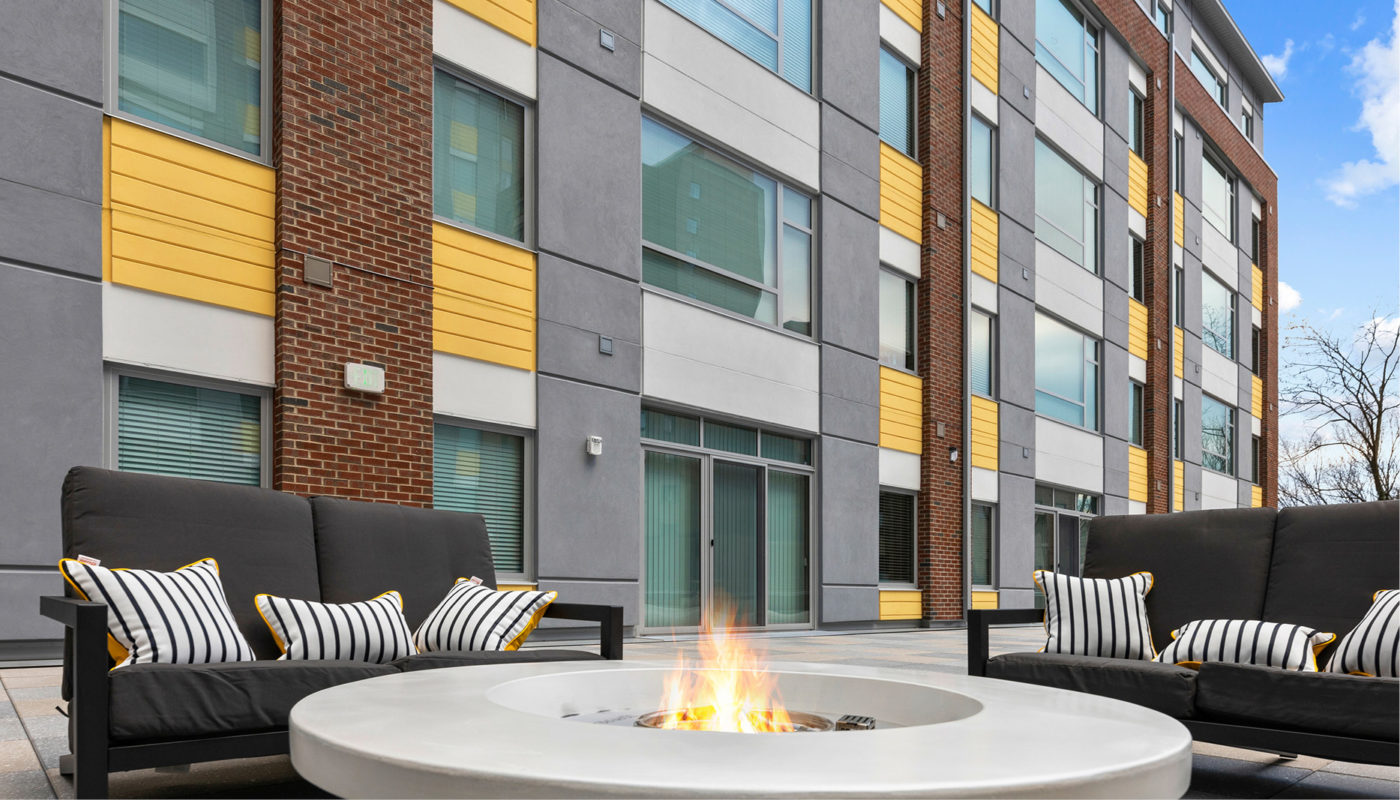 101 York apartment building incorporates a cozy fire pit in front for residents' enjoyment.