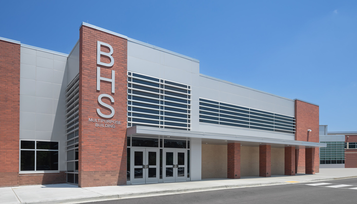 The exterior of Blythewood High School building with the words "BHS" on it.