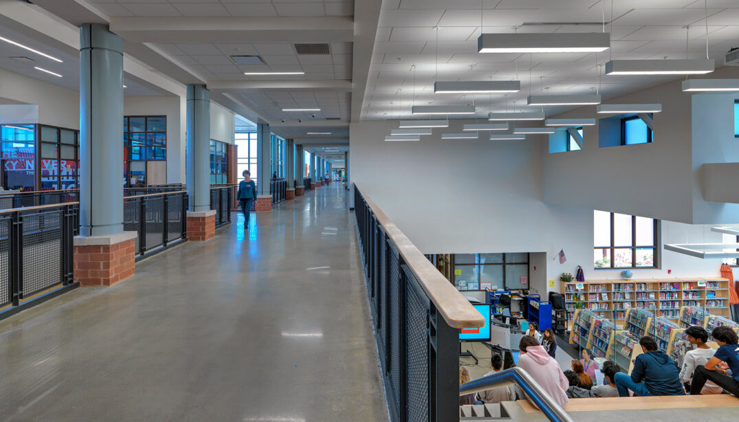 Corridor with view of media center in Tucker High School, a new k-12 facility in Virginia