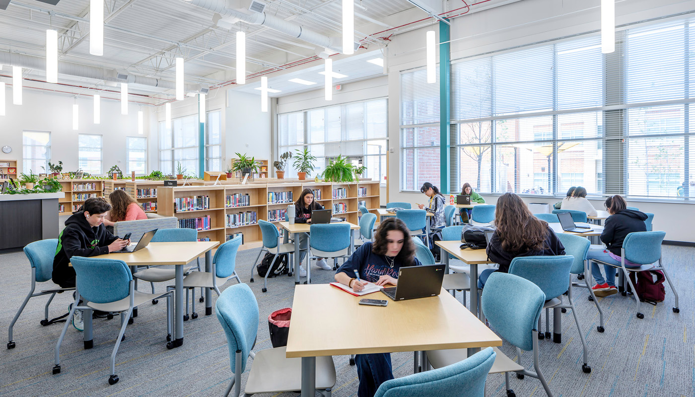 Students read in the media center in Chapel Hill High School, a renovated K-12 facility in North Carolina